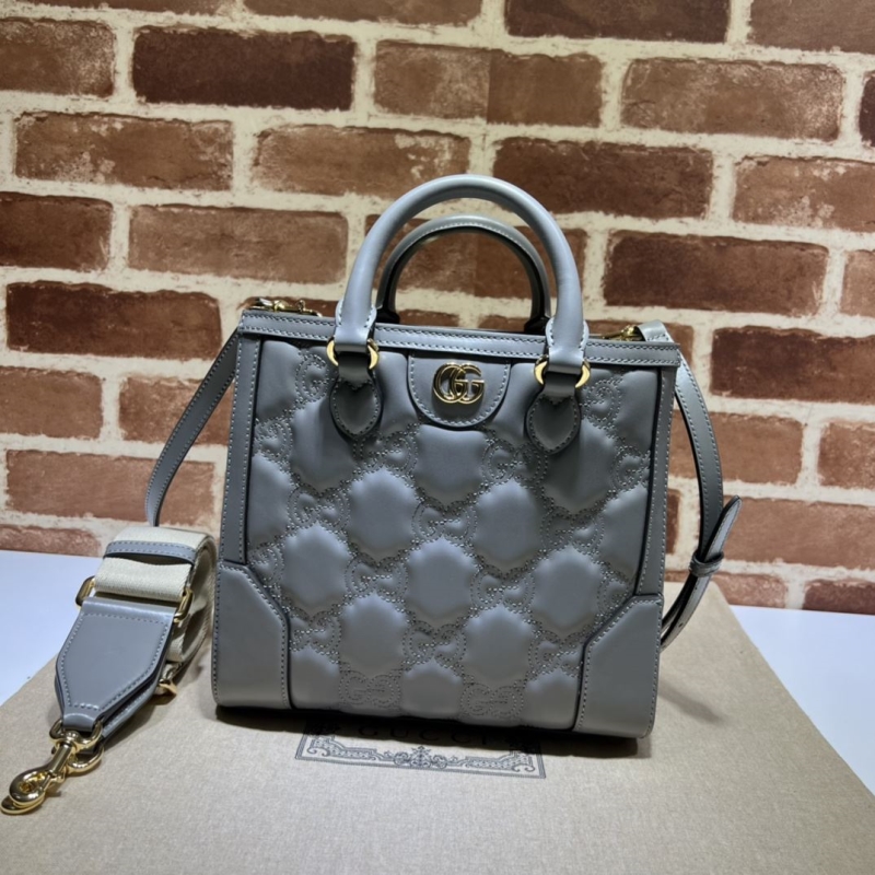 G*u*i top handle bags